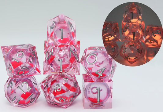 Sharp Edge Liquid Core RPG Dice Set - Radiant Pink Glow in the Dark